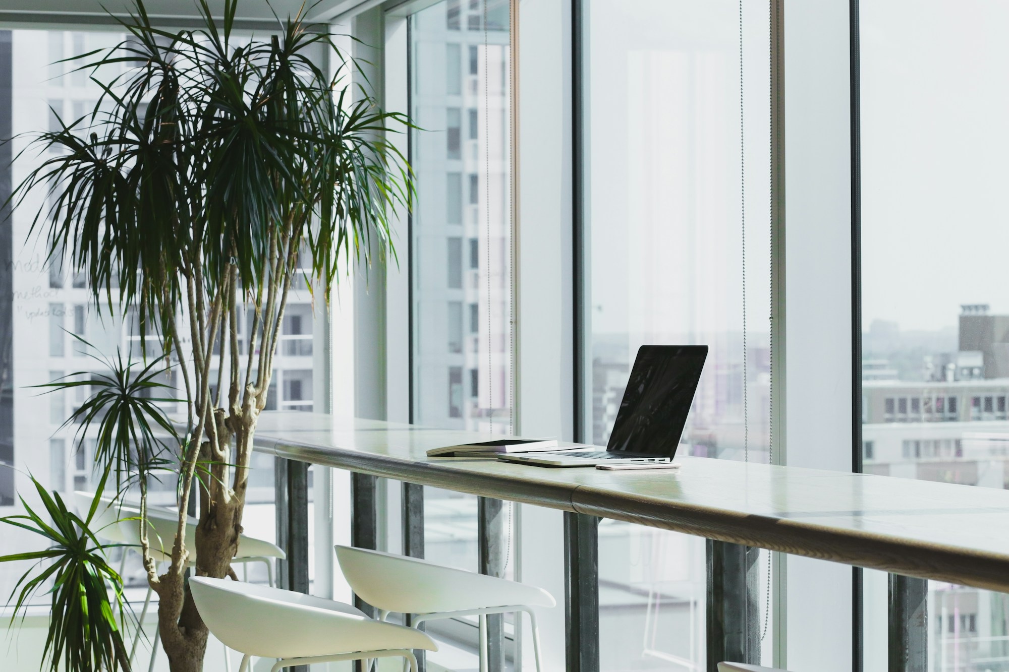 Contemporary workspace with simple furniture and daylight